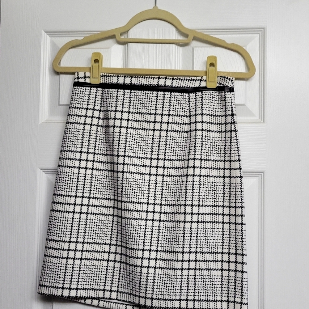 Black and white skirt with leather trim at the waist.  Gorgeous to wear out/work
